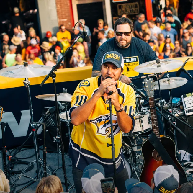 Luke Bryan performing at Nashville Predators