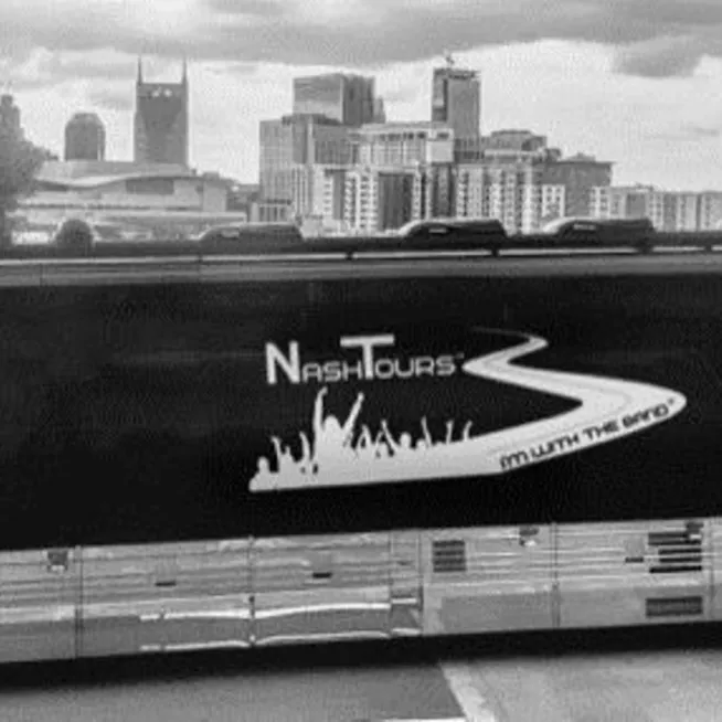 NashTours Bus in front of Nashville Skyline